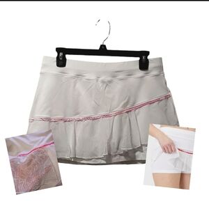 - SOFIBELLA BLISS SHEER RUFFLED SPORT SKORT